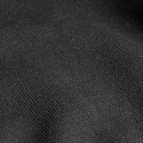 Close-up of the black knit fabric texture of the Zodia Zip-Up Sweater for a stylish look.