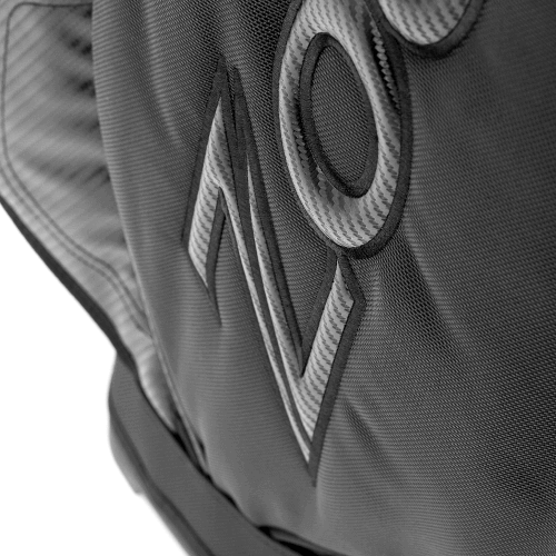 Close-up of the Zodia Carbon Design Caddy Bag II showcasing its durable carbon-look fabric and logo design.