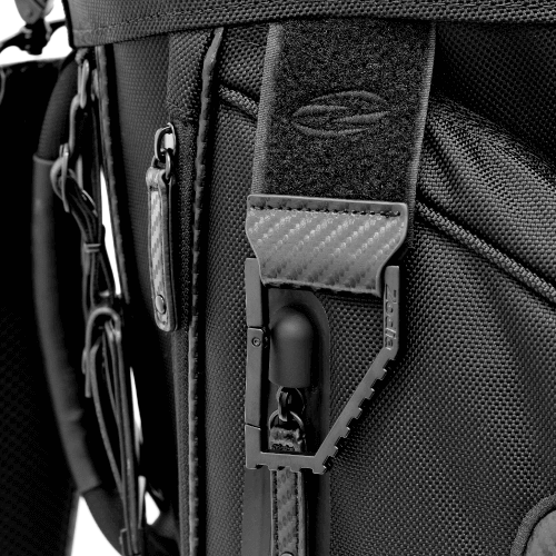 Close-up of Zodia Carbon Design Caddy Bag II strap showcasing durable materials and secure attachment features.