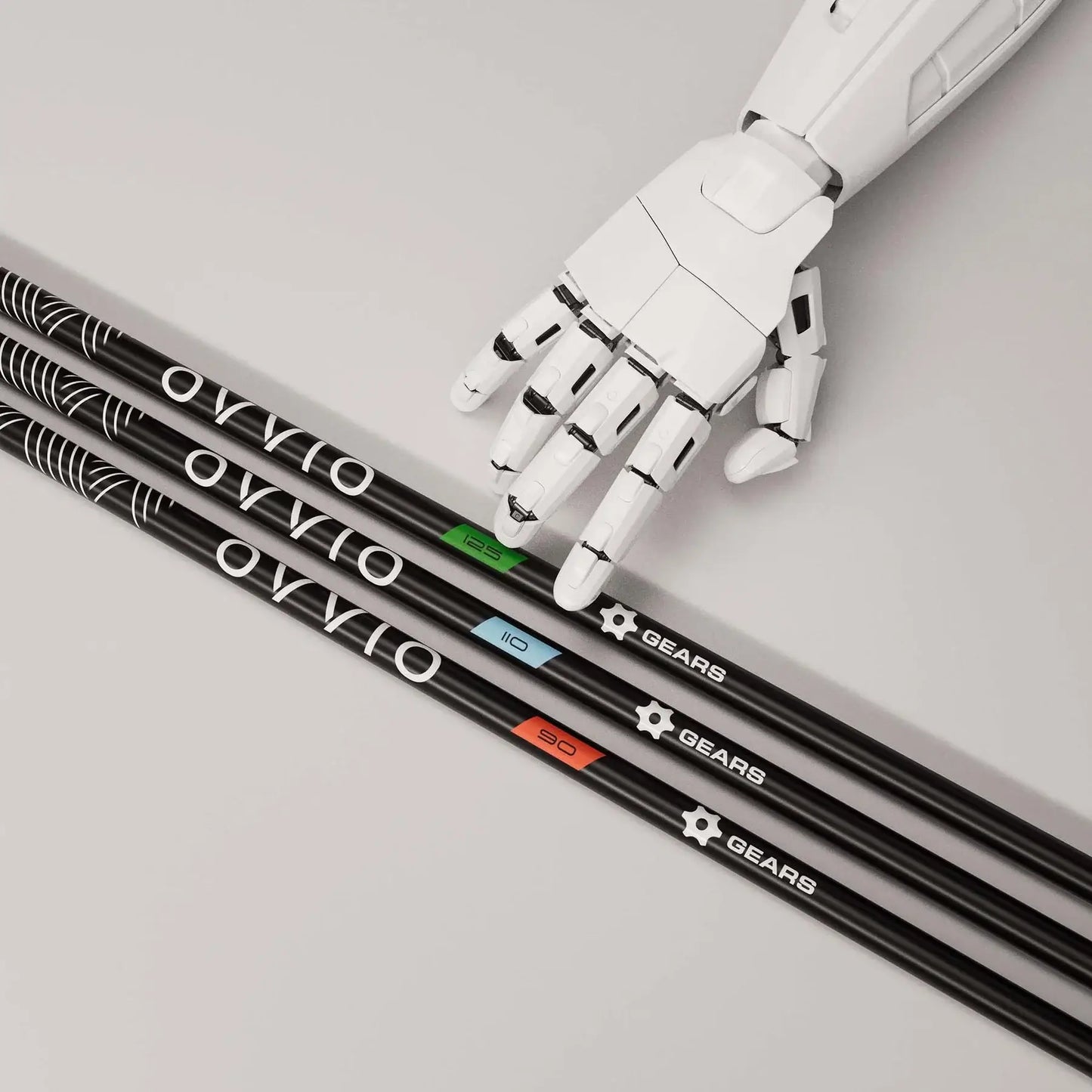 OVVIO Iron Shafts by GEARS Golf, displayed with a robotic hand, showcasing advanced graphite technology.