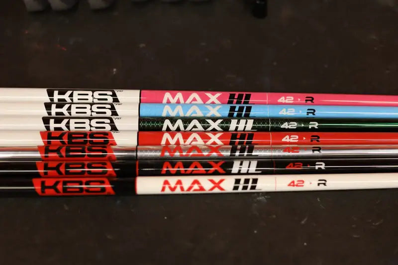 KBS MAX HL Graphite Wood Shafts in various colors, labeled with 'MAX HL' and '42 R' specifications.