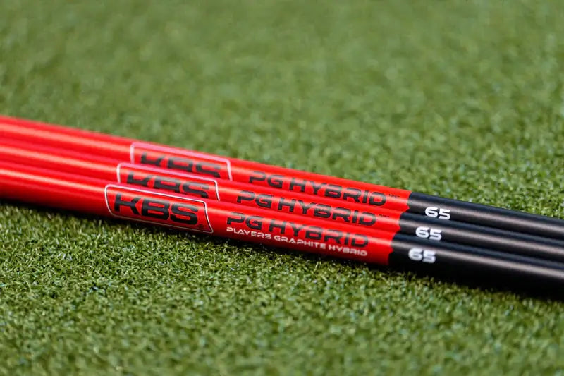 KBS Players Graphite Hybrid PGH shafts in red and black, designed for improved performance and easier launch.