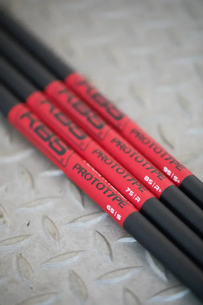 KBS Tour Graphite Hybrid Prototype Shafts with red and black design, showcasing the product for golf enthusiasts.