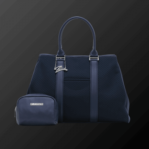 Zodia neoprene tote bag in navy blue with detachable pouch, featuring brand logo charm and durable design.