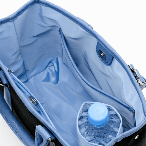 Interior view of the Zodia Neoprene Tote Bag Mini showing pockets and a side bottle holder.