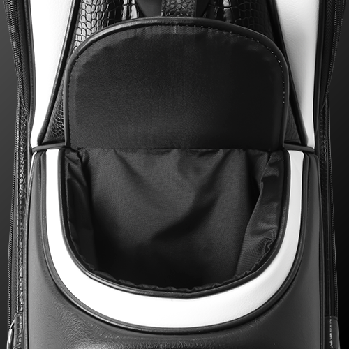 Close-up of the magnetic pocket on Zodia Standard Caddie Bag, showcasing its sleek black and white design.
