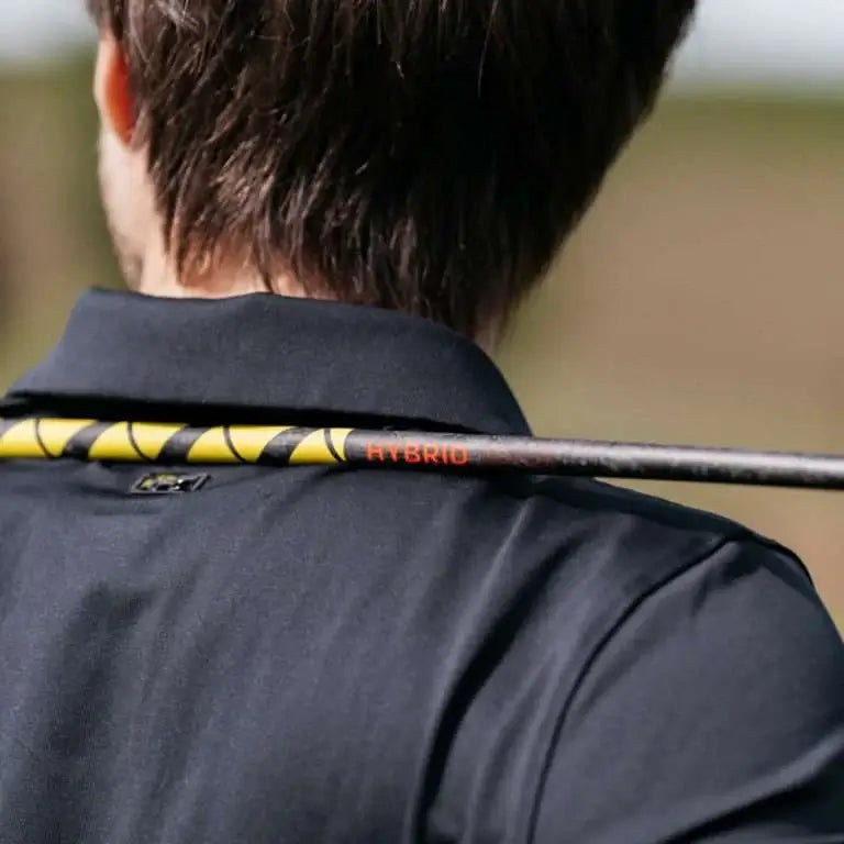 TPT Power Range Hybrid Shaft showcased on a golfer's shoulder, highlighting its unique design and features.
