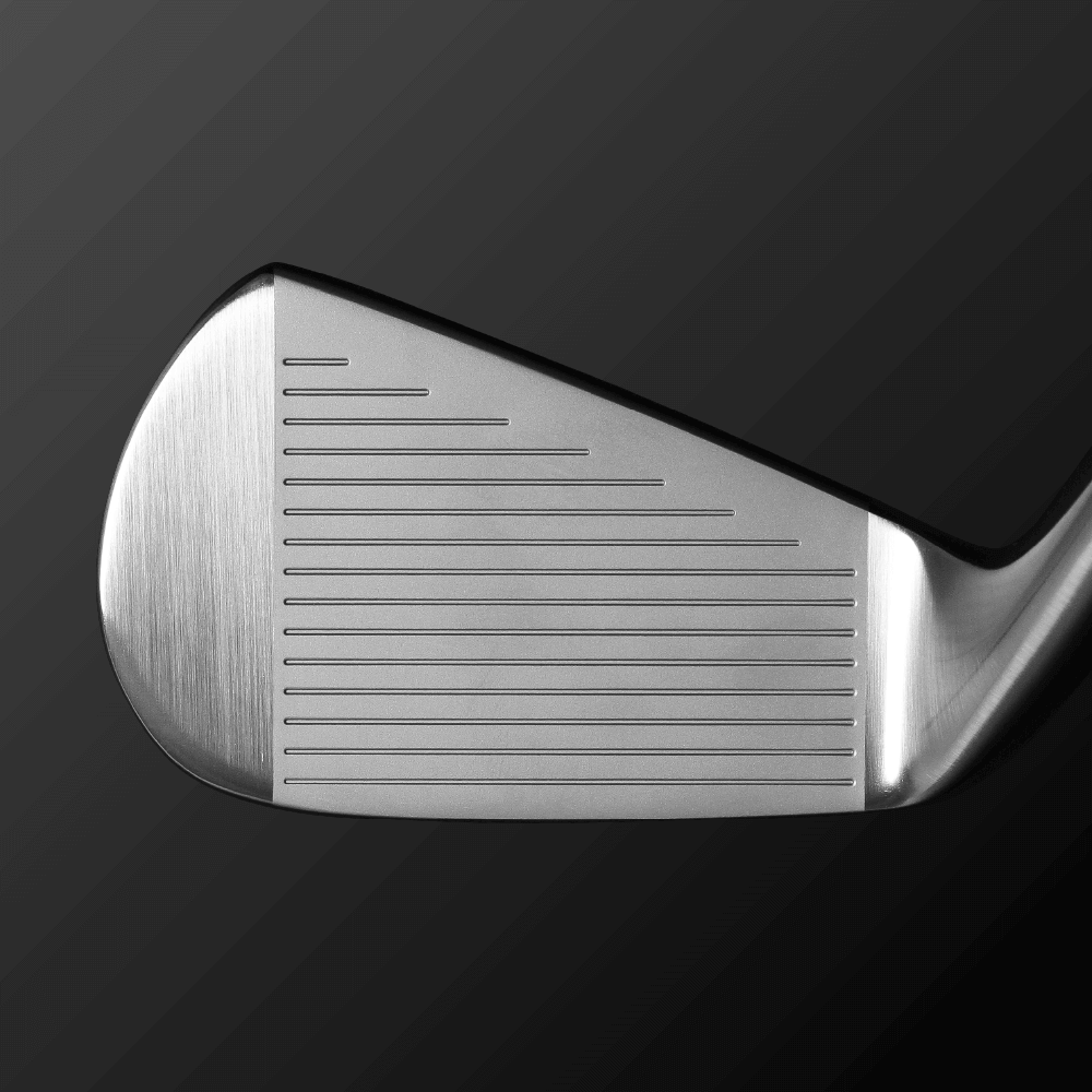 Close-up of Zodia Z521 iron clubface showcasing innovative design and precision grooves for optimal performance.