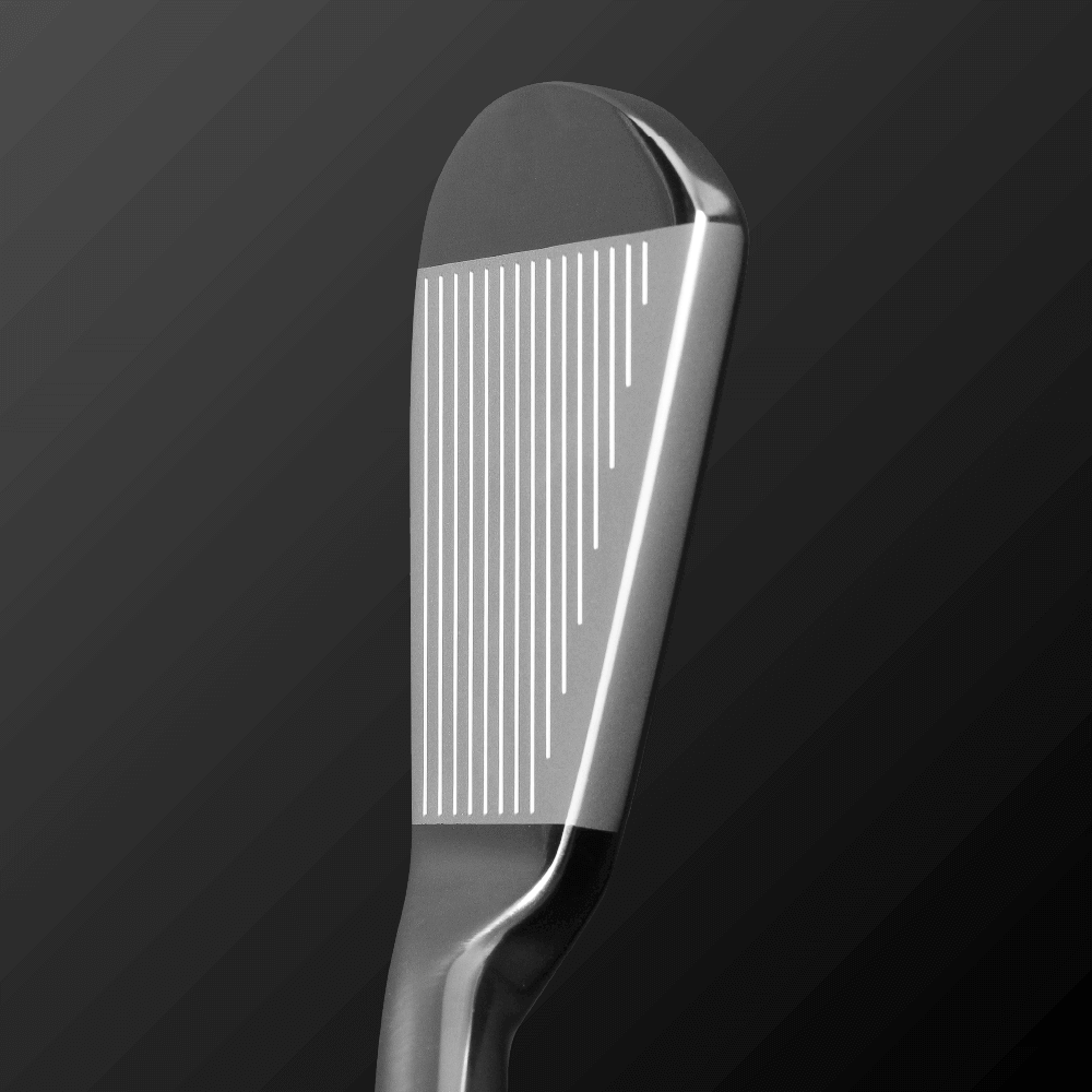 Close-up of Zodia Z521 iron club face showcasing grooves and sleek design for enhanced performance.