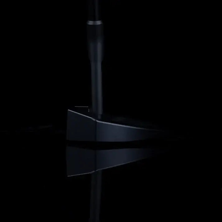 L.A.B. OZ.1i HS Standard Putter with a heel shaft design reflecting on a dark surface.