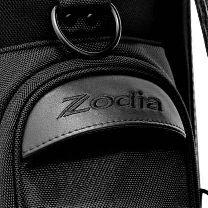 Close-up of Zodia logo on the Carbon Design Caddy Bag II, showcasing its durable fabric and sleek design.