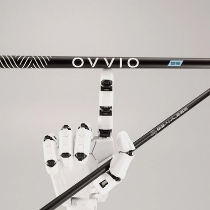 OVVIO green seamless wood shafts showcased with a robotic hand for advanced performance and technology.