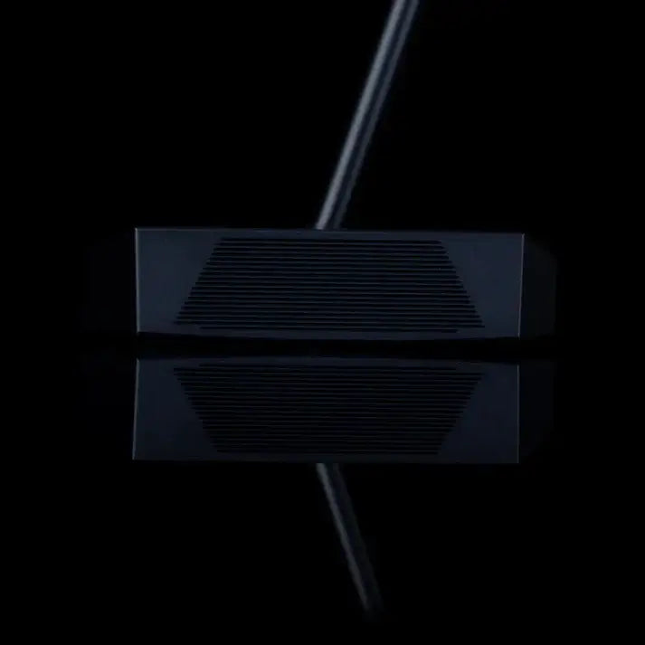 L.A.B. OZ.1 Stock Putter in sleek black finish on a reflective surface, showcasing its modern design.