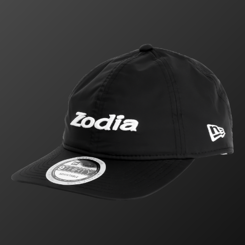 Zodia Waterproof Rain Cap in black, featuring a stretchable, water-resistant nylon material, adjustable size, and packable design.