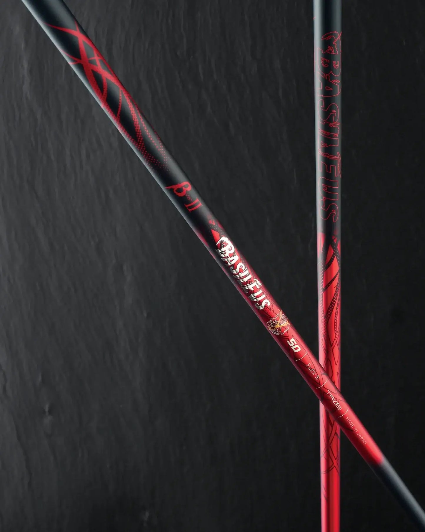 Basileus β Beta Ⅱ Shaft featuring bold red and black design, known for strong trajectory and high elasticity fibers.