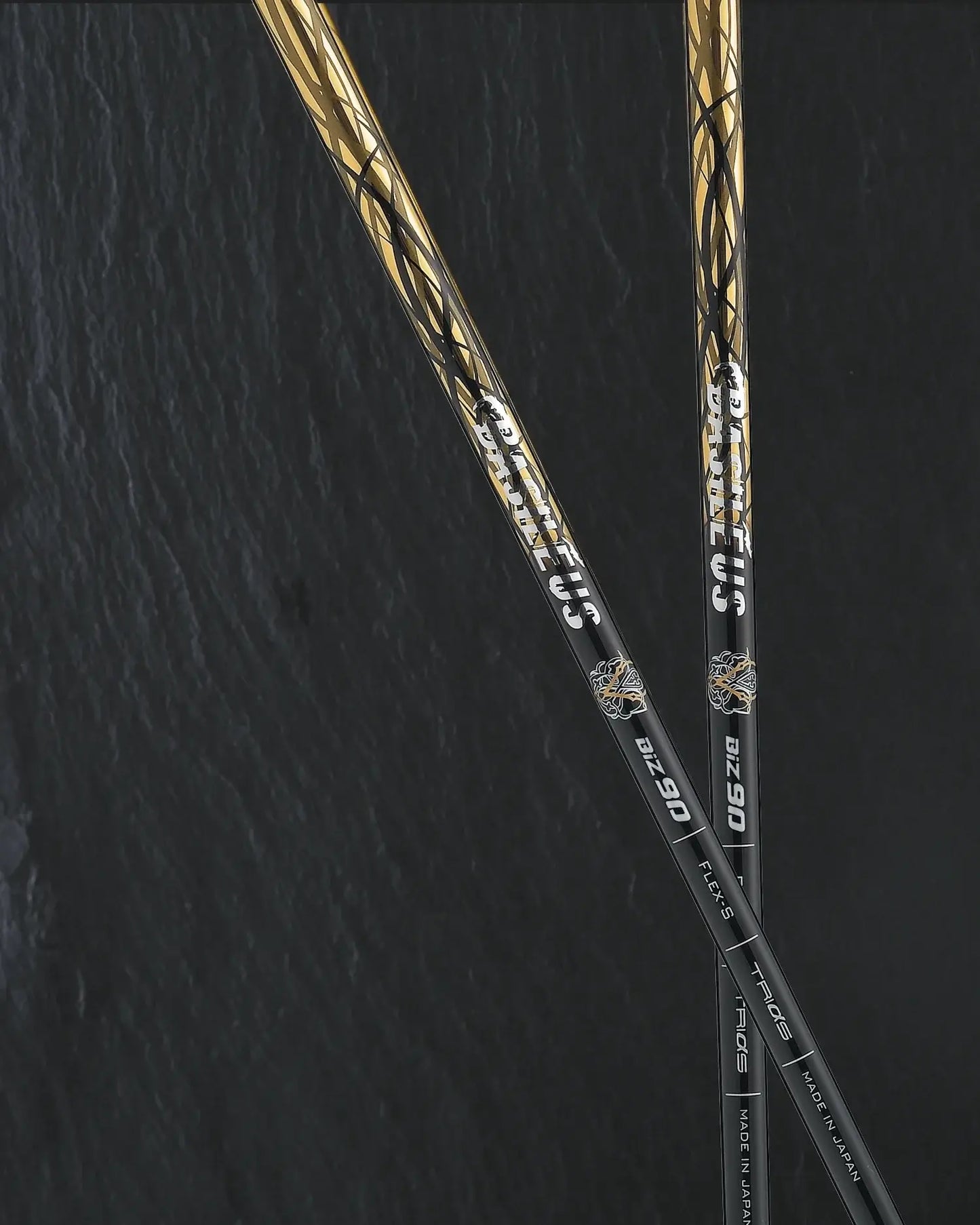 Basileus BiZ Rev.2 iron shafts in black and gold, featuring advanced carbon and boron construction for enhanced performance.