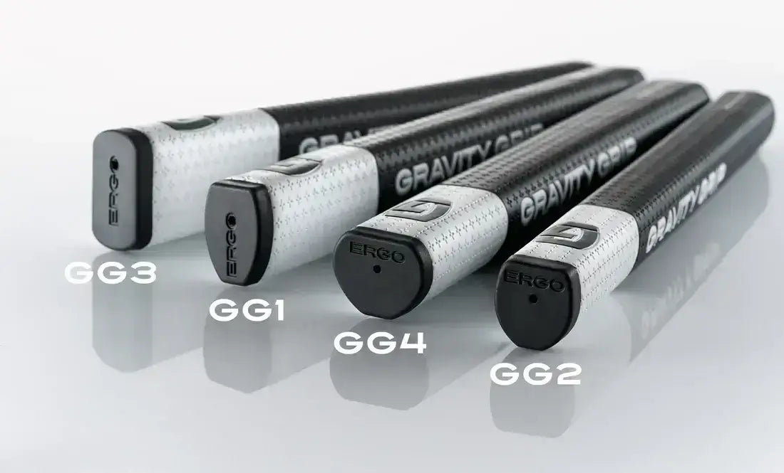 Image of four golf grips including GG1 Gravity Grip, showcasing design and material features.