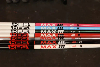 KBS MAX HL Graphite Wood Shafts in various colors, labeled with 'MAX HL' and '42 R' specifications.