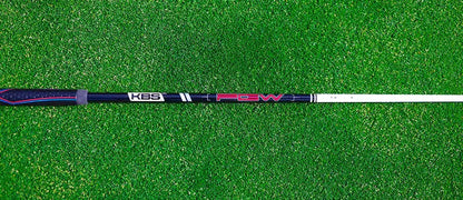 KBS PGW Players Graphite Wood Shaft on green turf, showcasing high-performance design for various swing speeds.