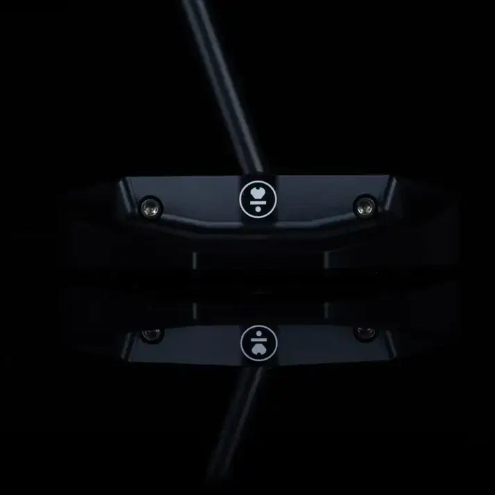 L.A.B. OZ.1i Stock putter black head with logo and reflection on a dark surface.