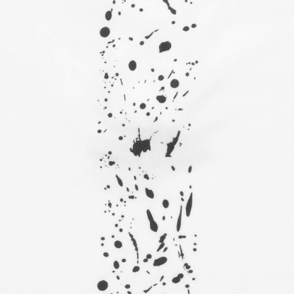Close-up of the Zodia Splash Polo Shirt's vertical splash design in monotone colors, showcasing stylish black patterns.