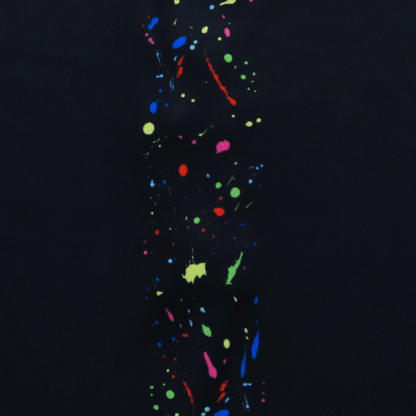 Colorful splash design on a black background, showcasing vibrant hues for a stylish polo shirt.