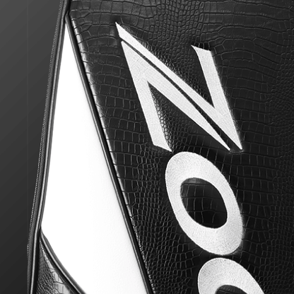 Close-up of Zodia Standard Caddie Bag showing black caiman pattern and logo detail in white.