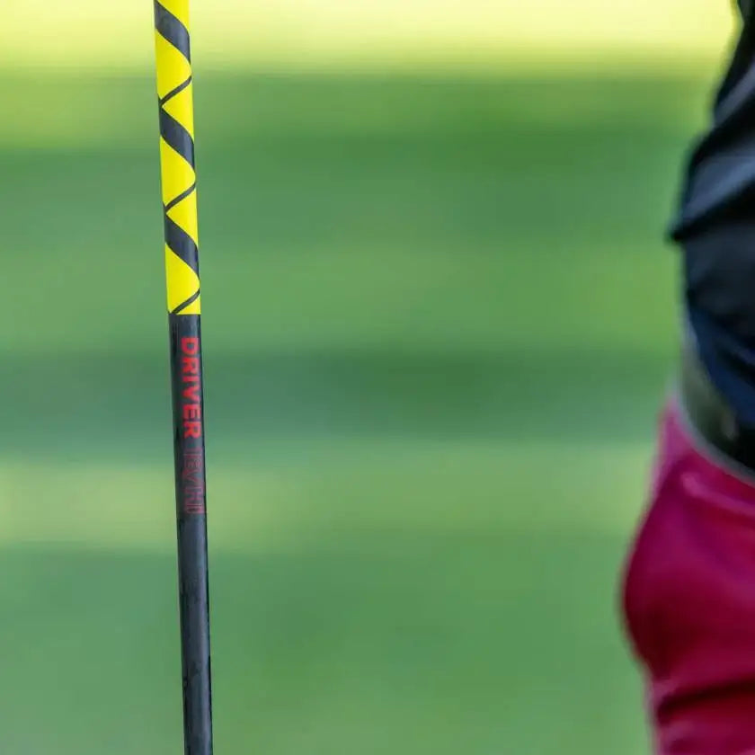 TPT Power Range Driver Shaft showcasing yellow and black design for optimal stability and consistency in golf performance.