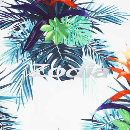 Zodia Botanical Polo Shirt fabric showcasing vibrant botanical pattern and logo, perfect for summer resort style.