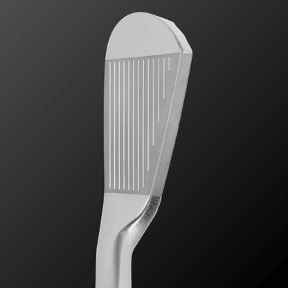 Close-up of Zodia Caiman IV CB golf club head showcasing the polished finish and precision grooves.