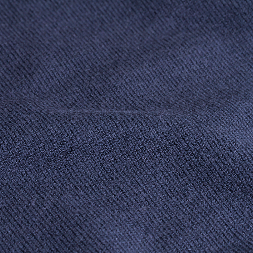 Close-up of Zodia crewneck sweater fabric in elegant navy color, showcasing its timeless knit design.
