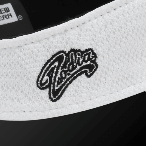 Zodia Diamond Era Sun Visor logo close-up, featuring breathable material and stylish design.