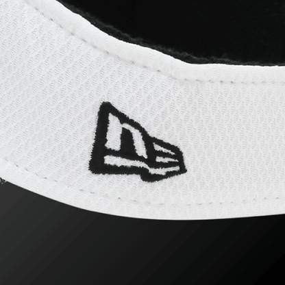 Close-up of the white Zodia Diamond Era Sun Visor with black three-dimensional logo and breathable material.