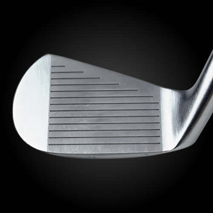 Close-up of Zodia Full Crocodile Muscle Back iron head showing sleek design and detailed grooves.