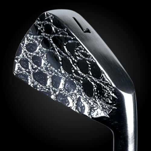 Close-up of Zodia Full Crocodile Muscle Back iron head showcasing realistic crocodile texture.