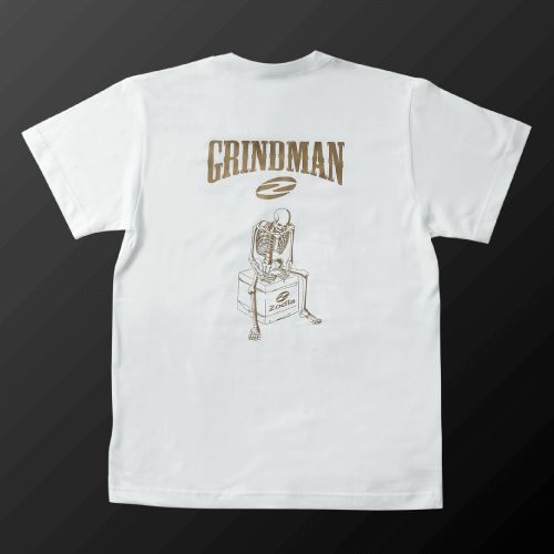 White Zodia Grindman T-Shirt featuring a skeleton illustration and bold 'GRINDMAN' text on the back.