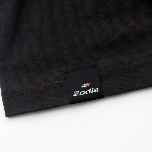 Black Zodia T-shirt label showcasing brand detail and quality craftsmanship.
