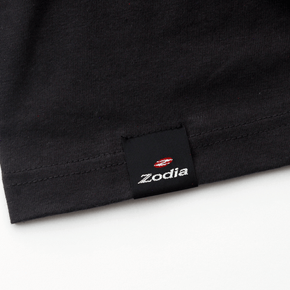 Black Zodia T-shirt label showcasing brand detail and quality craftsmanship.