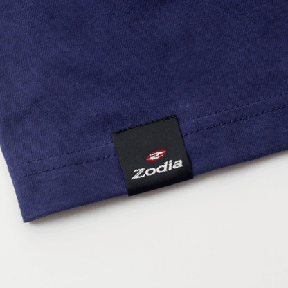 Close-up of Zodia Grindman T-Shirt label showcasing brand logo on navy fabric for stylish branding.
