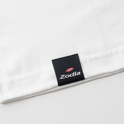Zodia brand label on a white t-shirt highlighting quality craftsmanship in casual apparel.