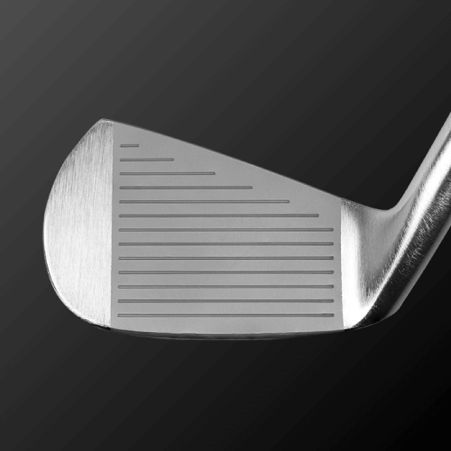Close-up of Zodia Half Crocodile golf club head, showcasing the sleek muscle back design and precision grooves.