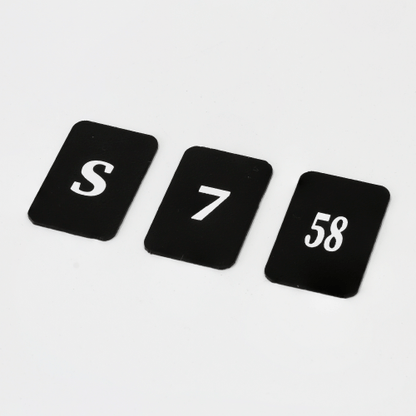 Three black golf club identifiers showing S, 7, and 58 for easy club selection and organization.