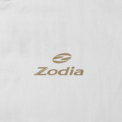 Zodia logo printed in gold on a white fabric background, representing premium quality and branding.