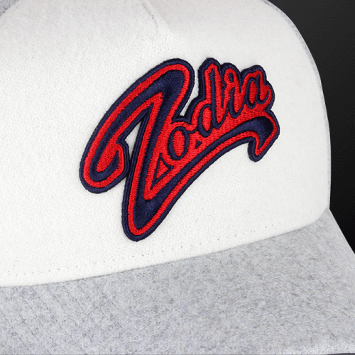 Zodia × NEW ERA wool cap in gray and white with vibrant logo, perfect for autumn and winter outfits.