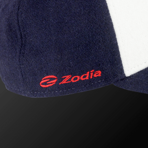 Close-up of Zodia wool cap showcasing the logo on a navy and white design, ideal for autumn and winter outfits.