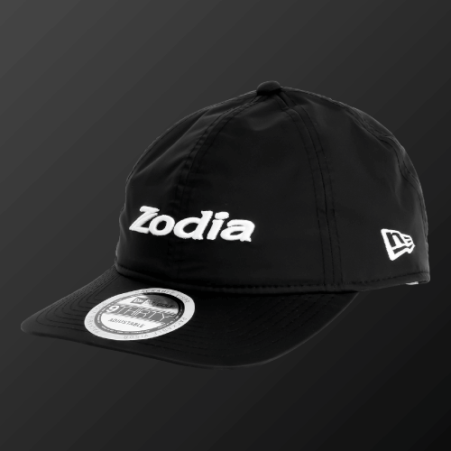 Zodia Waterproof Rain Cap in black, featuring a stretchable, water-resistant nylon material, adjustable size, and packable design.