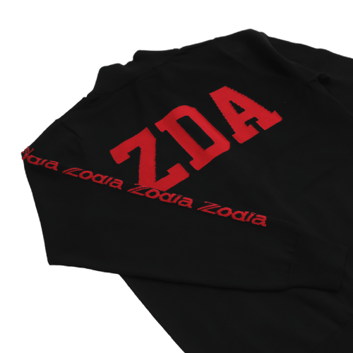 Zodia Zip-Up Sweater featuring bold 'ZDA' logo in red on black fabric, showcasing stylish and functional design.